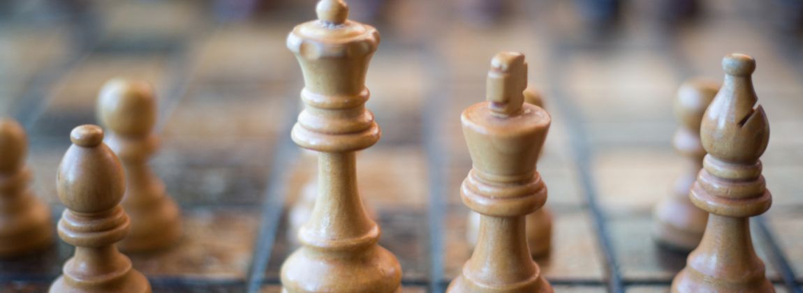 Chess pieces arranged on a board