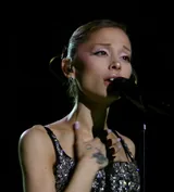 Ariana Grande singing at the Eternal Sunshine Tour in Brooklyn, New York, on July 18, 2026