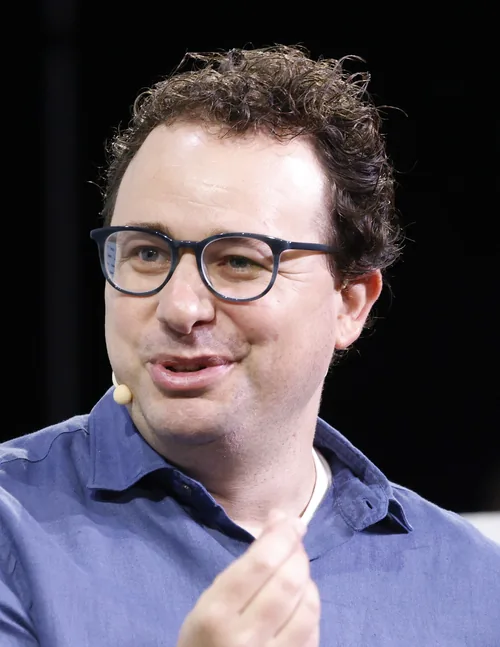 Dario Amodei speaking at TechCrunch Disrupt in San Francisco in September 2023