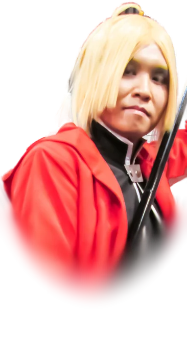A cosplayer in costume as Edward Elric, photographed at AniManGaki in 2014