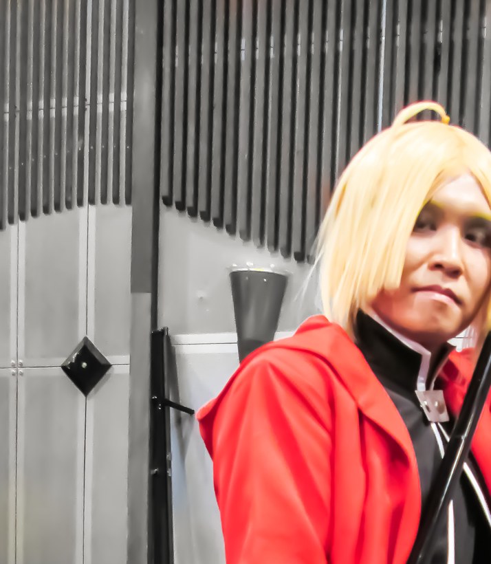 A cosplayer in costume as Edward Elric, photographed at AniManGaki in 2014