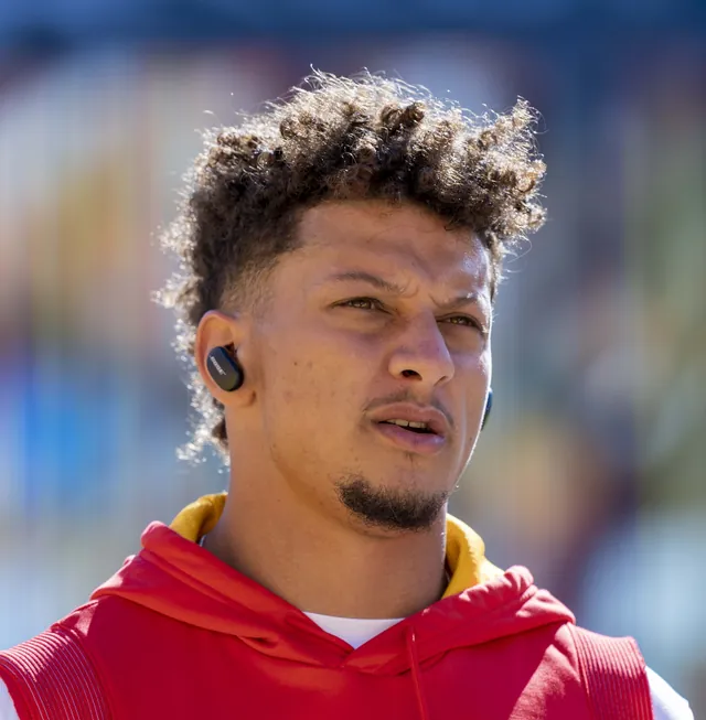 Patrick Mahomes on the sideline in Kansas City Chiefs gear in October 2021
