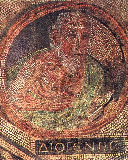Roman floor mosaic showing the philosopher Diogenes seated with his cloak in a round medallion, with his name in Greek capital letters beneath