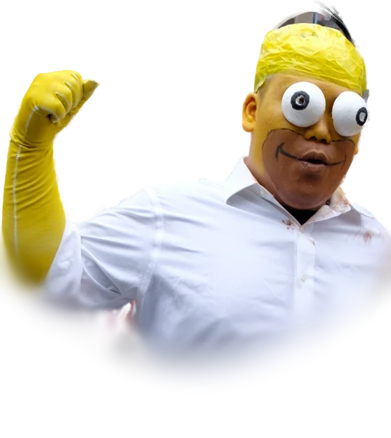 A cosplayer in yellow face paint with large googly eyes and a white dress shirt dressed as Homer Simpson, with a raised yellow-gloved fist, at Comic World Taiwan in December 2015