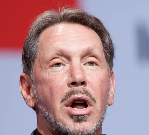Larry Ellison speaking into a microphone at an Oracle event