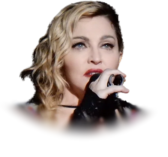 Madonna singing into a microphone in a black lace sleeve at the Rebel Heart Tour in Stockholm in November 2015
