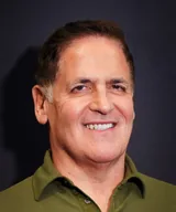Mark Cuban smiling in a green polo shirt at PaleyFest in October 2023