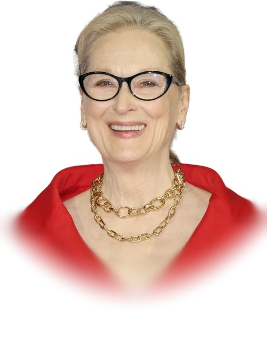 Meryl Streep smiling in black-framed glasses and a red jacket at a press conference in Seoul in April 2026