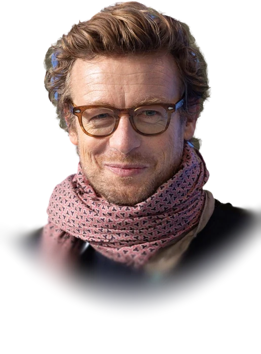 Simon Baker, the actor who played Patrick Jane in The Mentalist, smiling in tortoiseshell glasses and a pink patterned scarf at the Berlin International Film Festival in February 2020