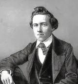 Engraved portrait of the chess master Paul Morphy seated in a dark frock coat with one arm resting on a chair