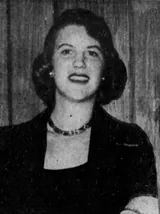 Black-and-white newspaper portrait of Sylvia Plath smiling, with dark wavy hair, a dark top and a beaded necklace, published in 1953