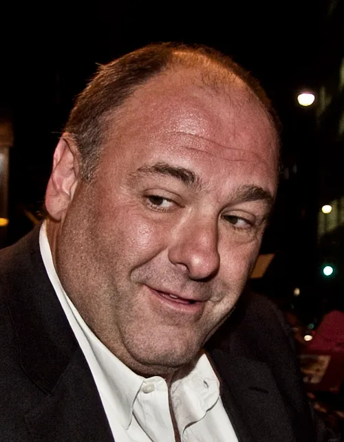James Gandolfini, the actor who played Tony Soprano in The Sopranos, in a dark jacket and open-collar white shirt with his head tilted, at the Toronto International Film Festival in September 2011