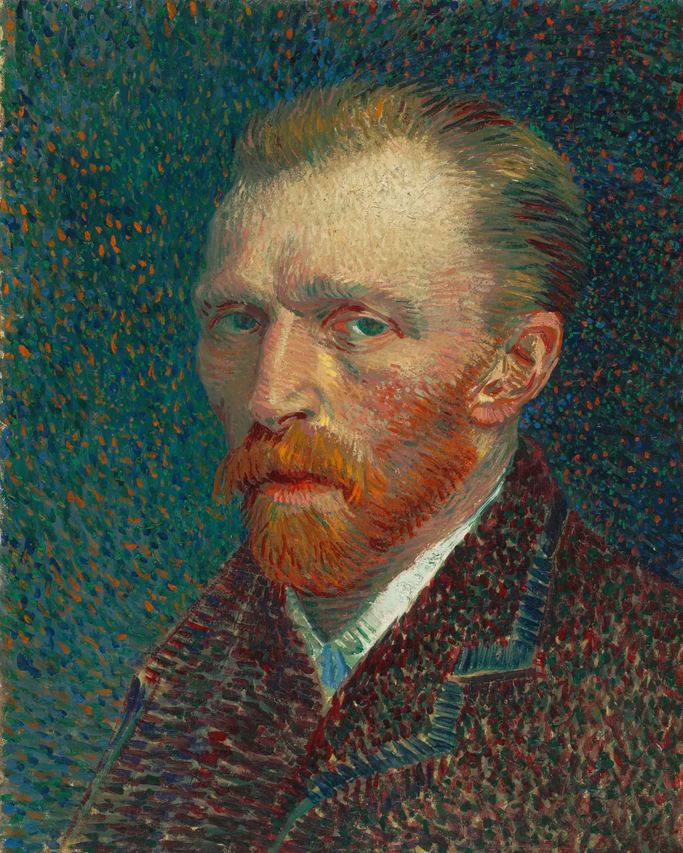 Vincent van Gogh with short red hair and a red beard, in a brown jacket and white collar, in his 1887 oil self-portrait against dabs of blue-green and orange paint