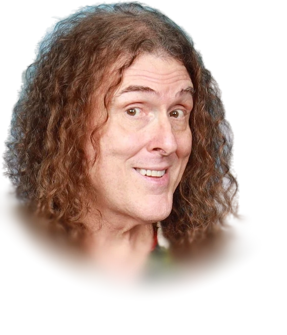 Weird Al Yankovic with long curly hair in a parrot-print shirt at GalaxyCon St. Louis in October 2025